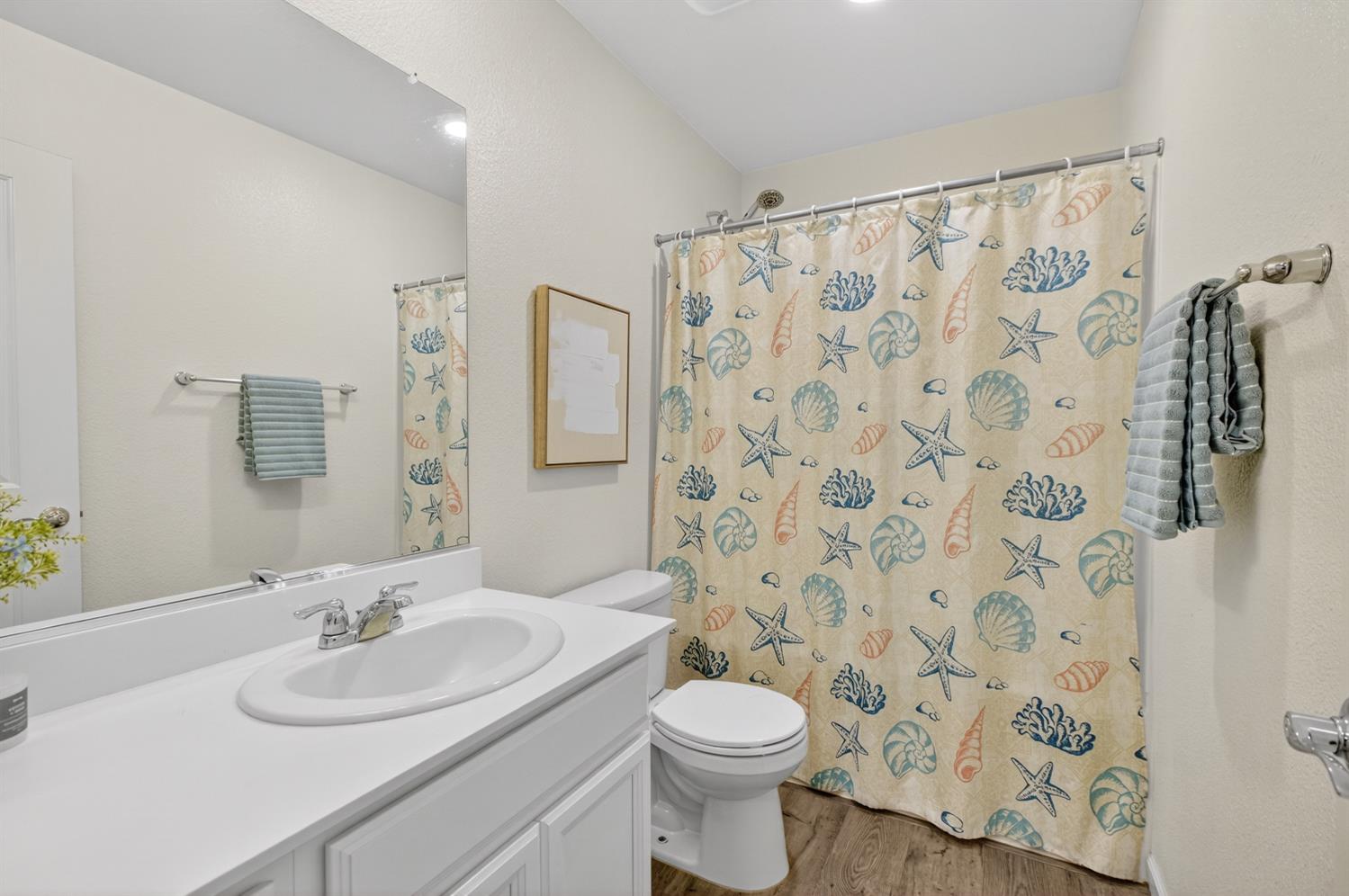 11786 Socrates Way Rancho Cordova, CA 95742 - Photo 16 of 48 a bathroom with a sink and a mirror