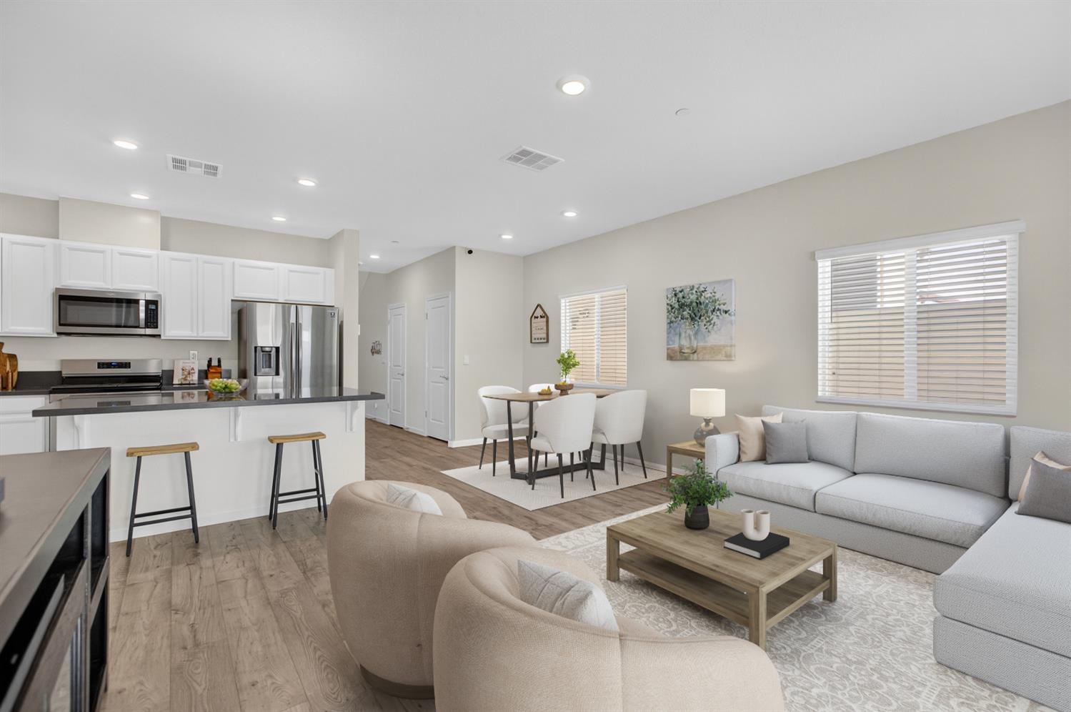 11786 Socrates Way Rancho Cordova, CA 95742 - Photo 3 of 48 a living room with furniture kitchen and a wooden floor