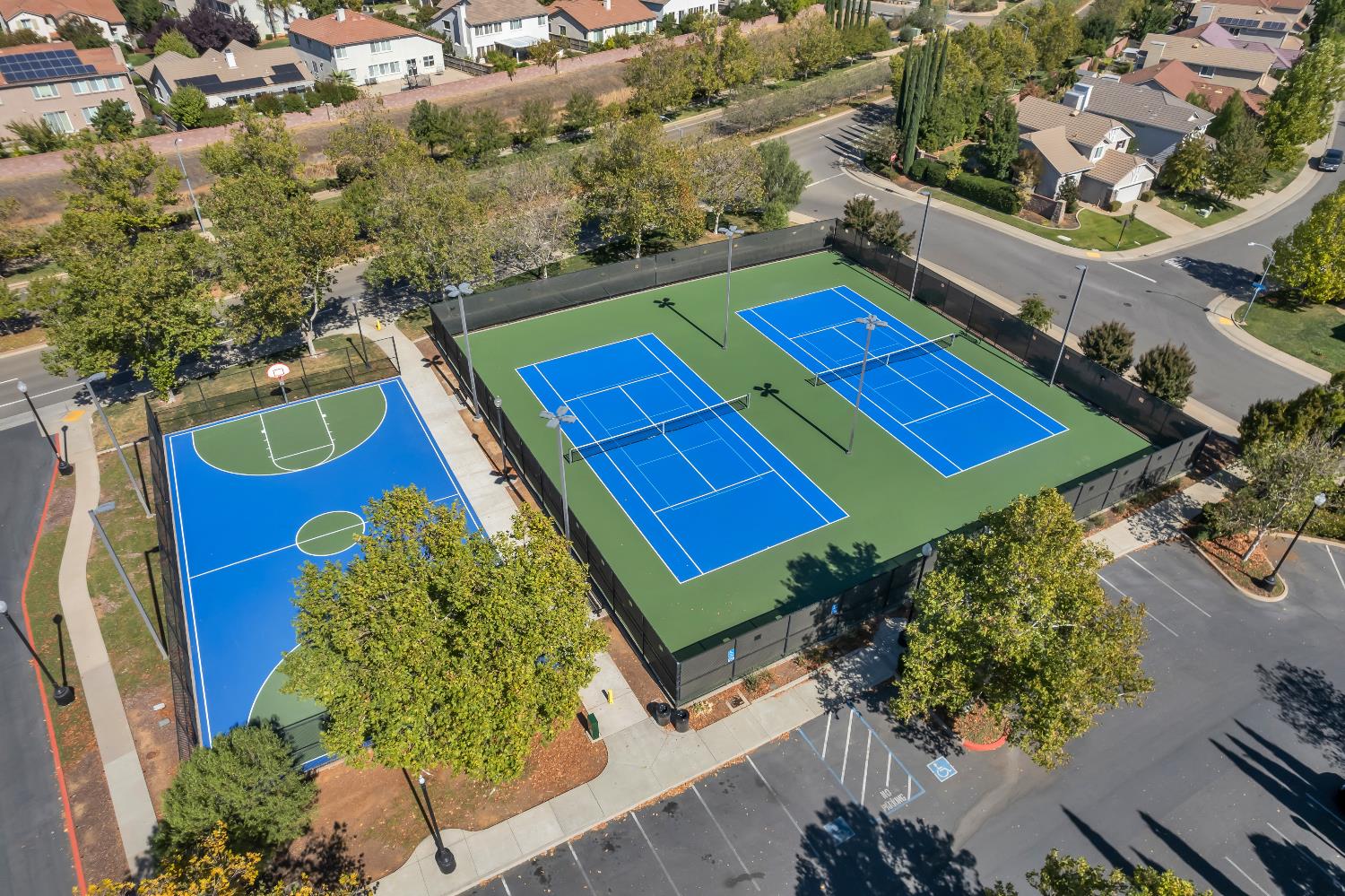 11786 Socrates Way Rancho Cordova, CA 95742 - Photo 36 of 48 an aerial view of a pool patio outdoor seating and fire pit