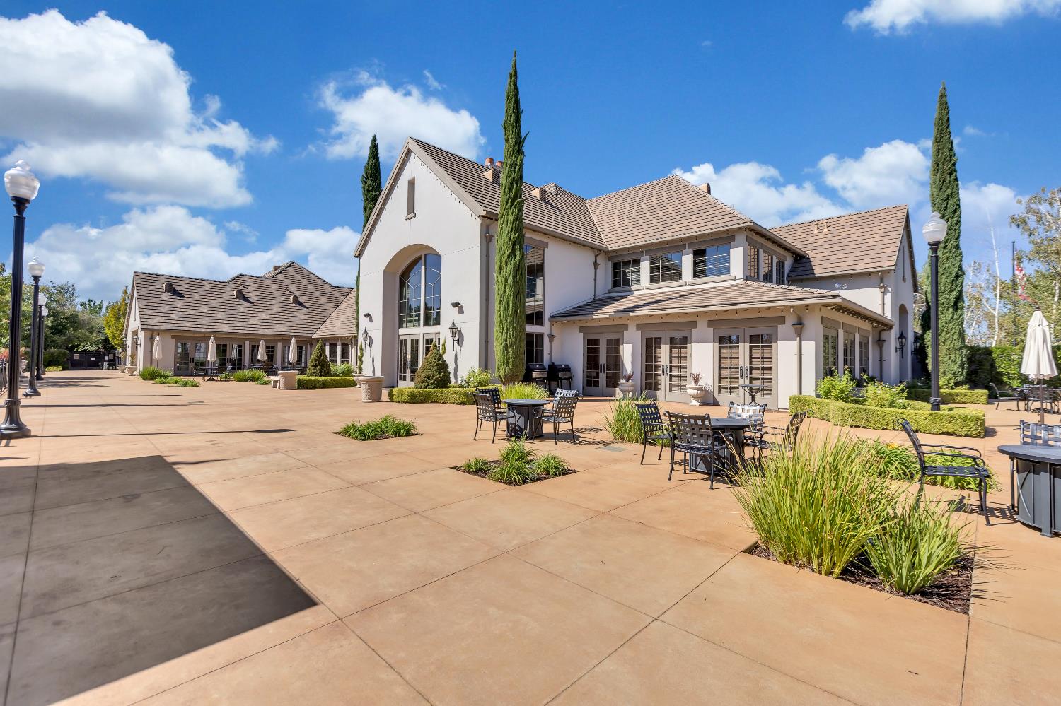11786 Socrates Way Rancho Cordova, CA 95742 - Photo 37 of 48 a view of a building with sitting area and garden