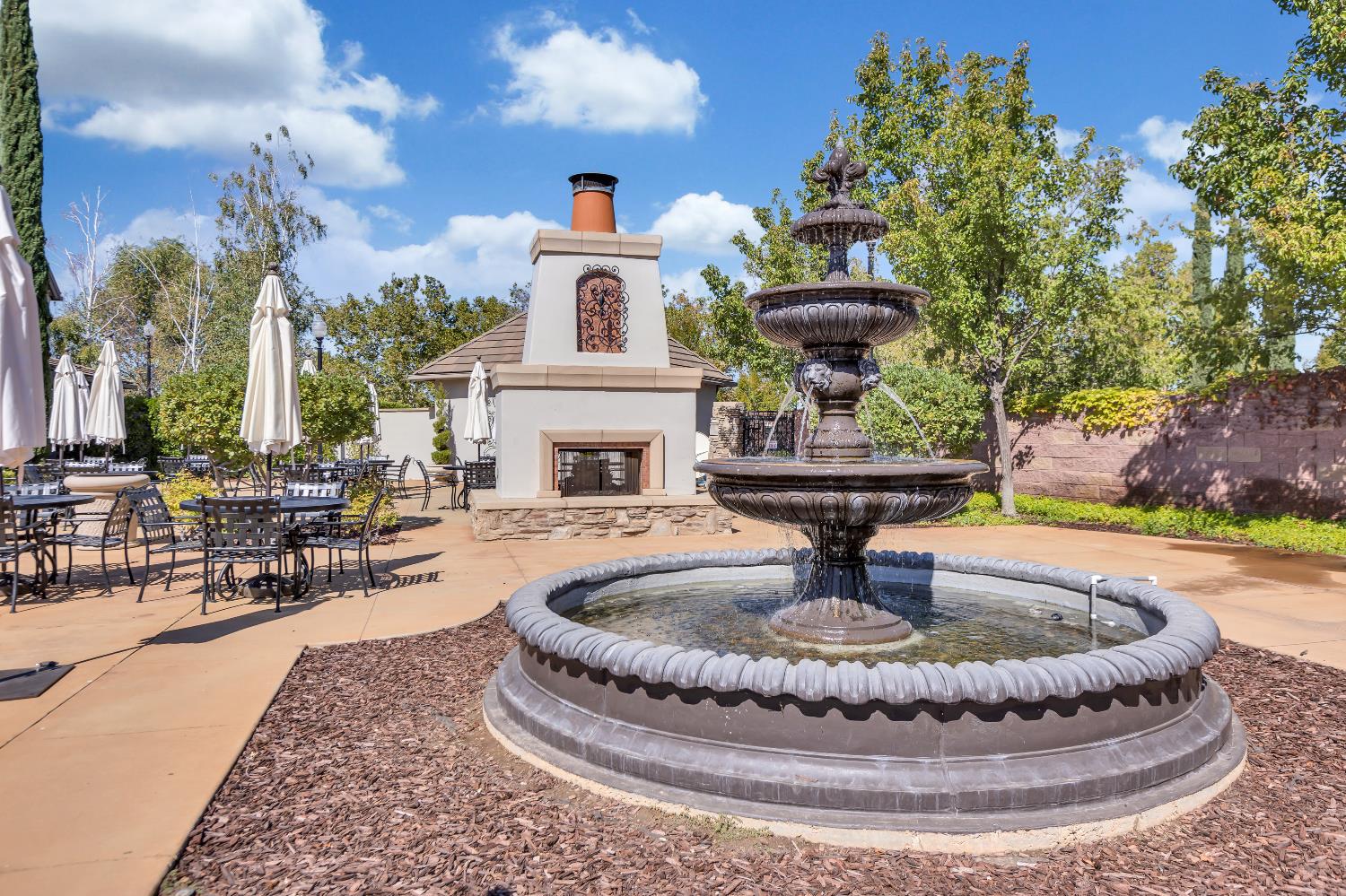 11786 Socrates Way Rancho Cordova, CA 95742 - Photo 44 of 48 a view of a fountain in the patio with a fountain