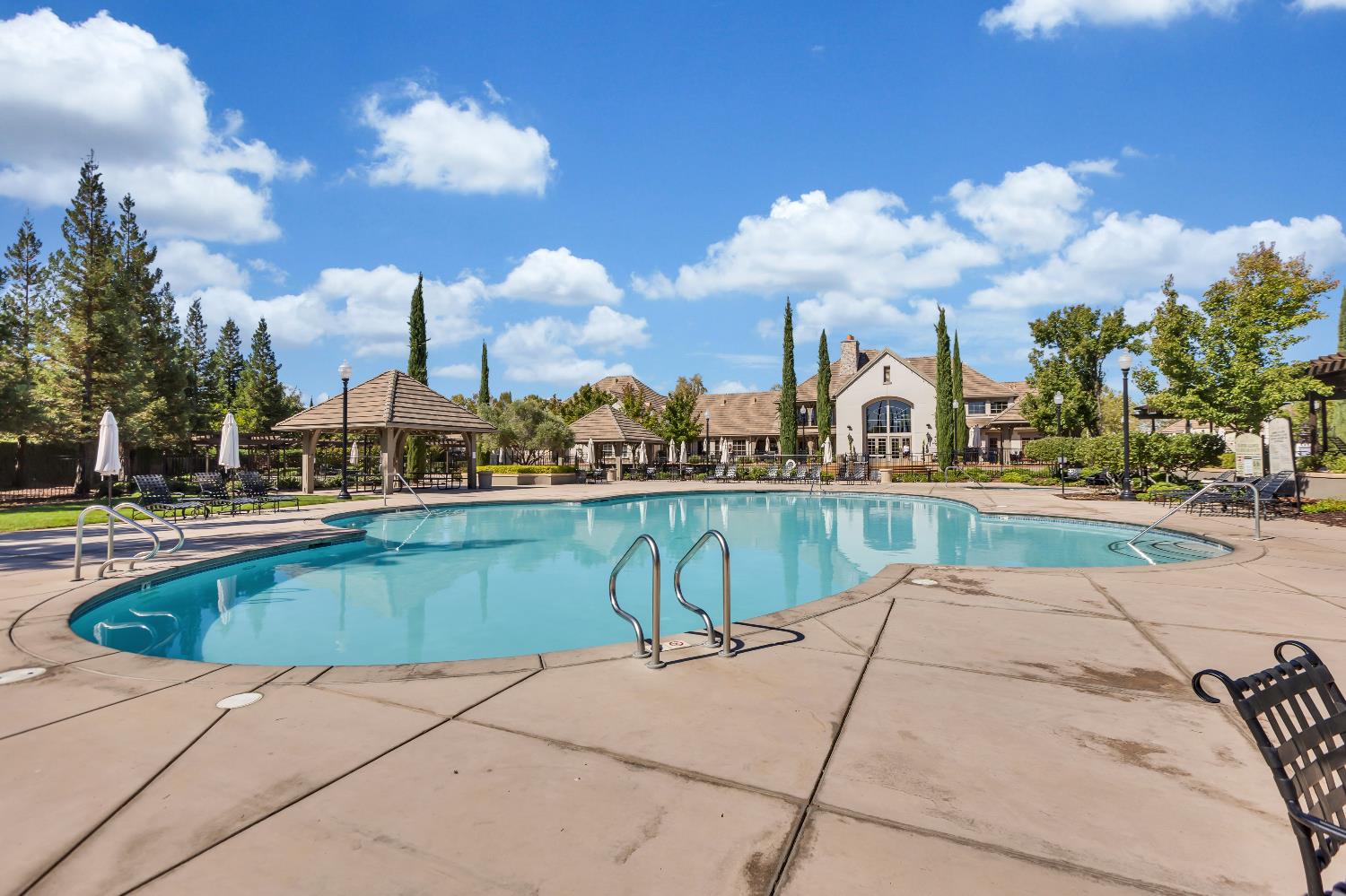 11786 Socrates Way Rancho Cordova, CA 95742 - Photo 48 of 48 a view of a swimming pool and a lot of buildings