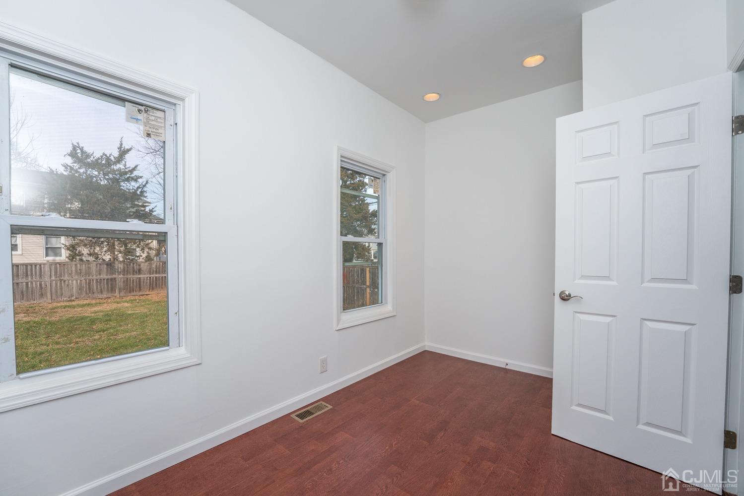 42 Meadow Road Edison, NJ 08817 - Photo 16 of 35 an empty room with windows