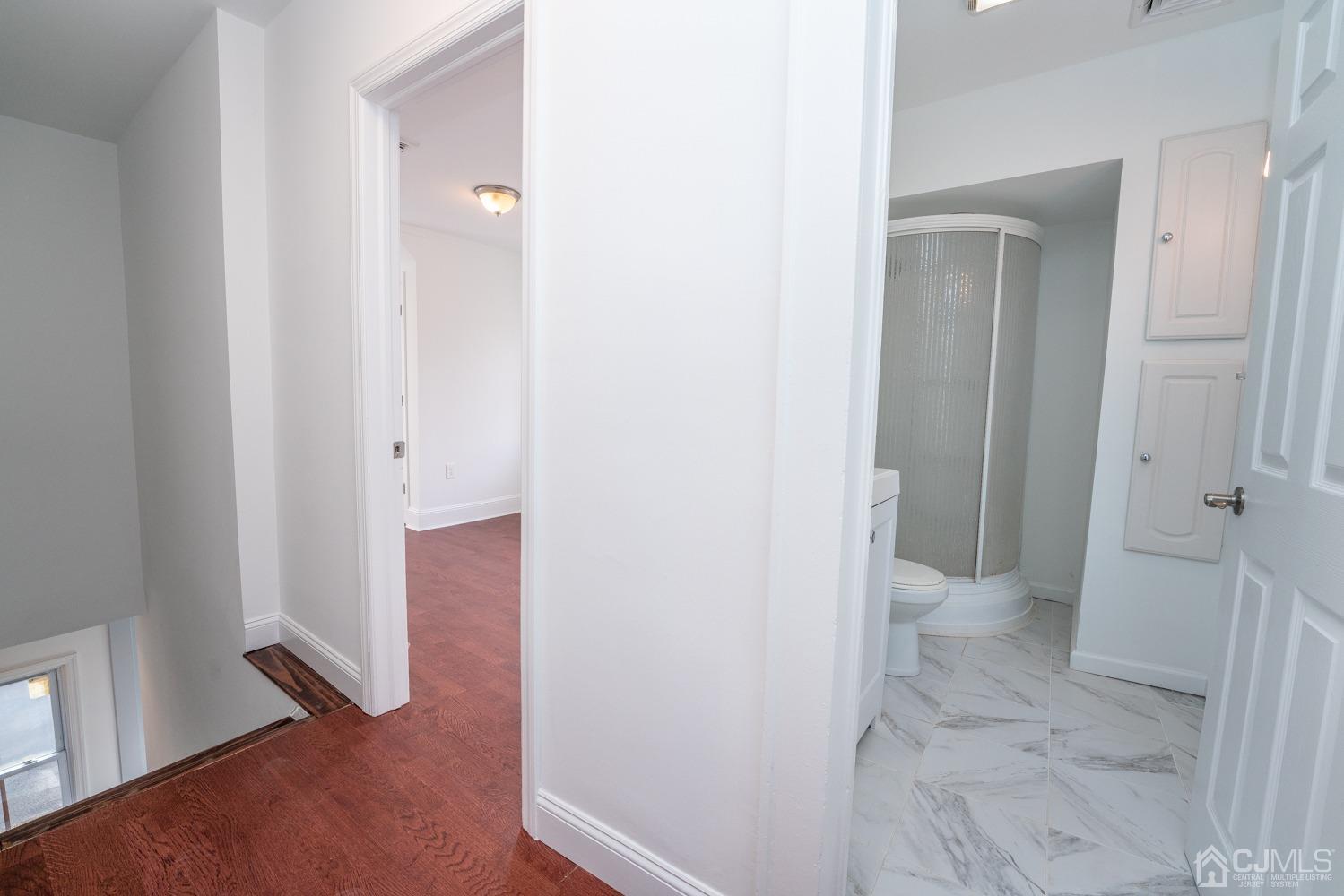 42 Meadow Road Edison, NJ 08817 - Photo 22 of 35 an empty room and an entrance to other room