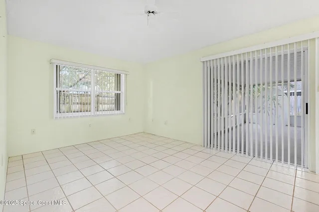 a kitchen with stainless steel appliances a refrigerator and microwave