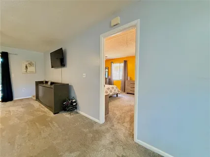 a bathroom with a shower and a sink