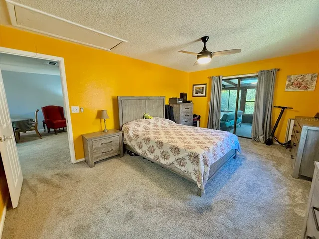 a view of a bathroom from a hallway