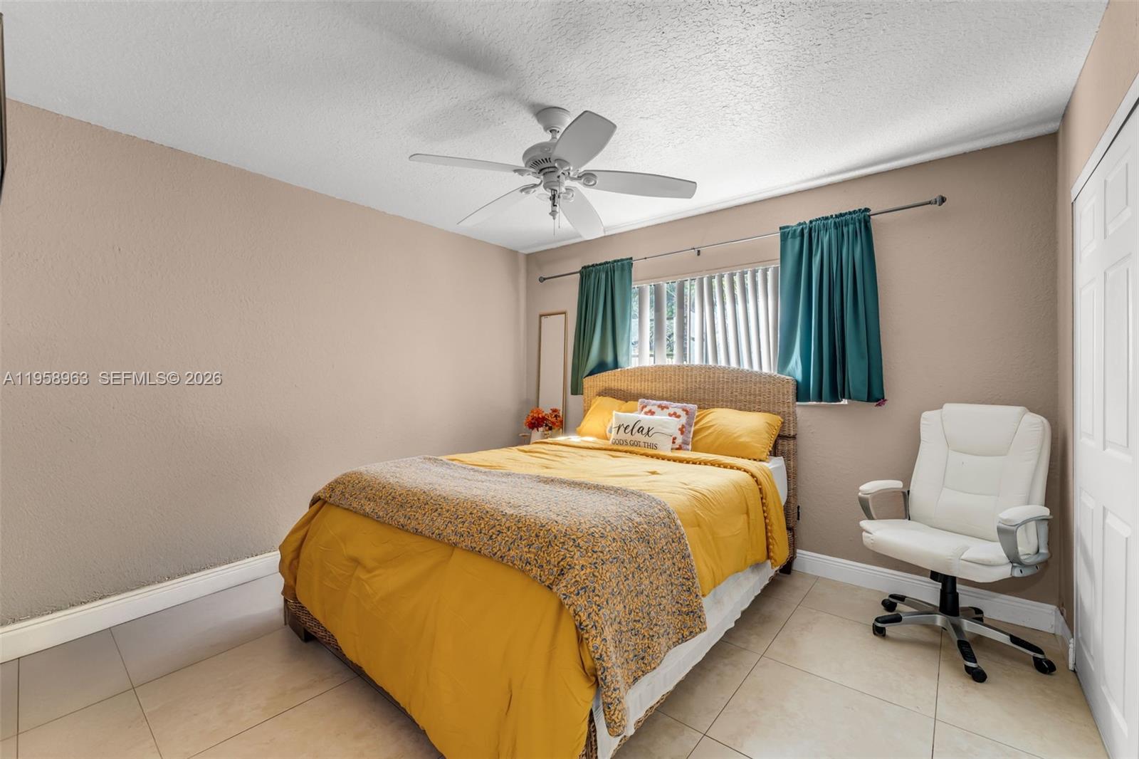 16564 Southwest 153rd Court Miami, FL 33187 - Photo 17 of 45 a bedroom with a bed and a couch