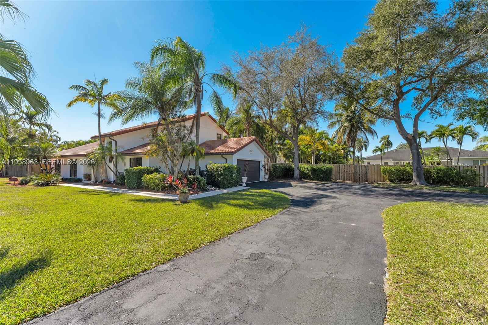 16564 Southwest 153rd Court Miami, FL 33187 - Photo 5 of 45 a view of swimming pool with garden