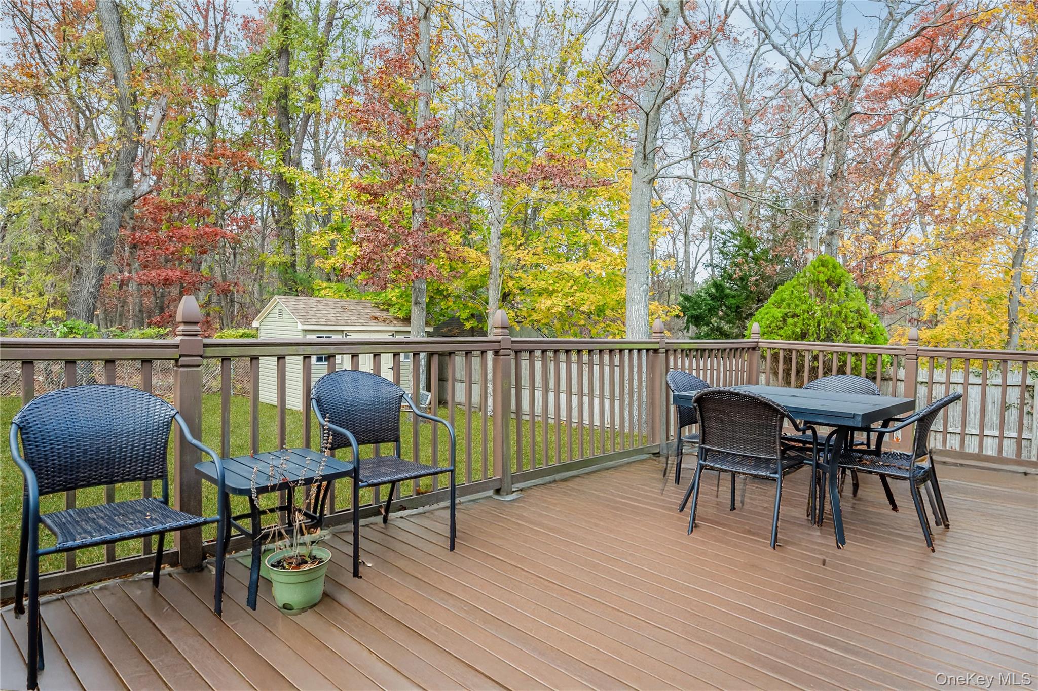 180 Lakeside Trail Ridge, NY 11961 - Photo 21 of 22 a view of a chairs and table on the wooden floor