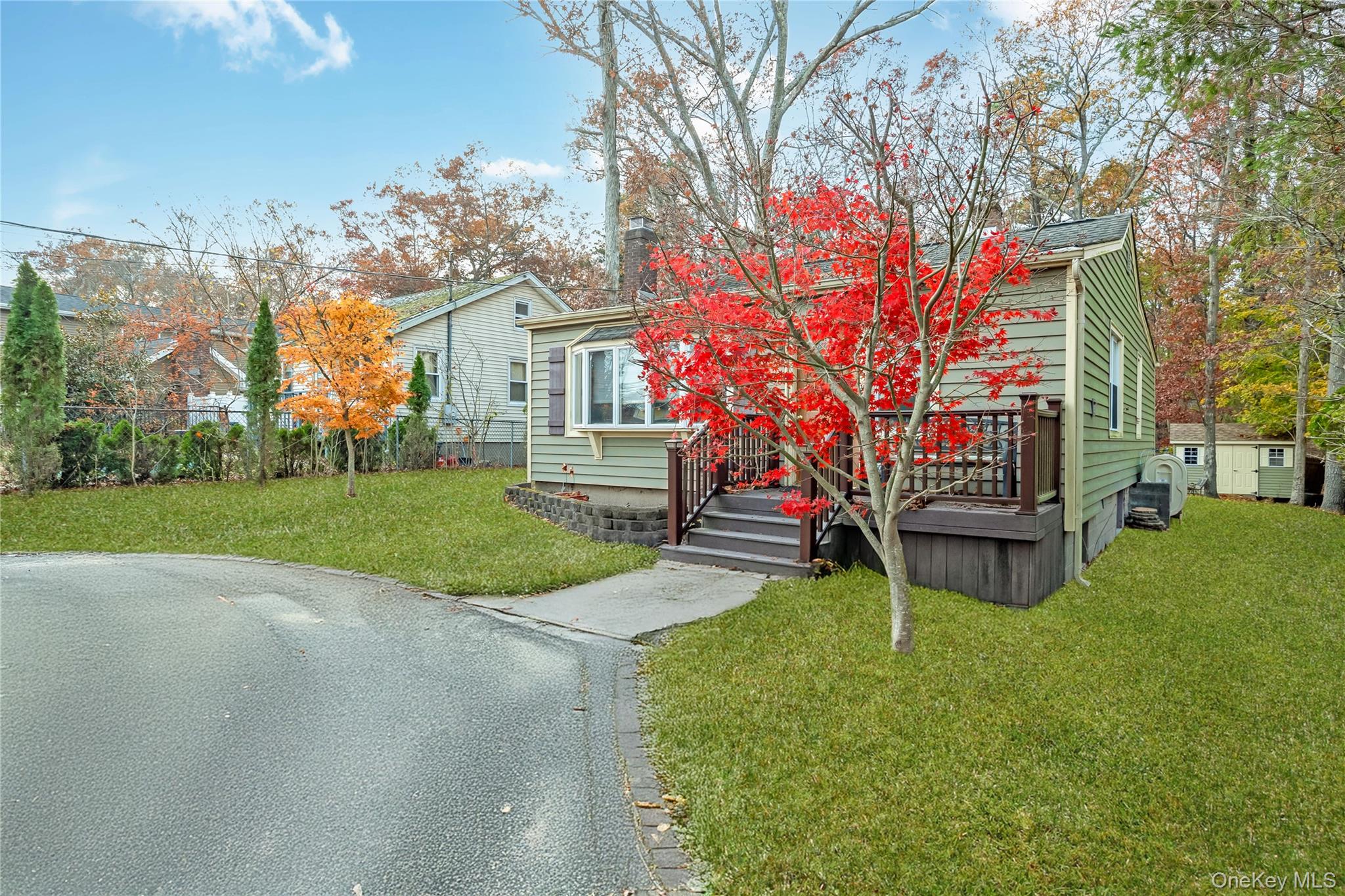 180 Lakeside Trail Ridge, NY 11961 - Photo 3 of 22 a view of a house with a back yard