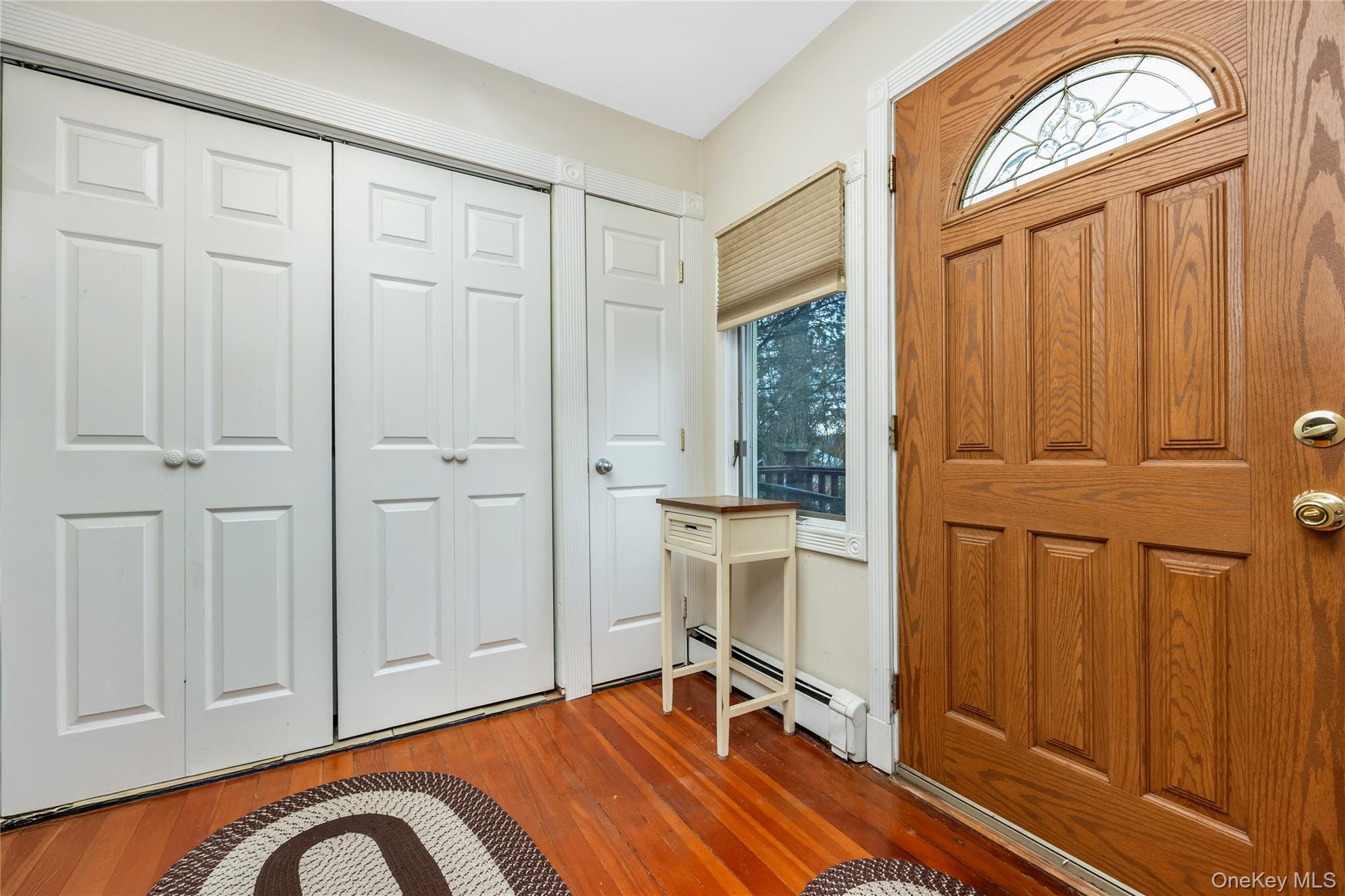 180 Lakeside Trail Ridge, NY 11961 - Photo 10 of 22 a view of a livingroom with furniture and hardwood floor
