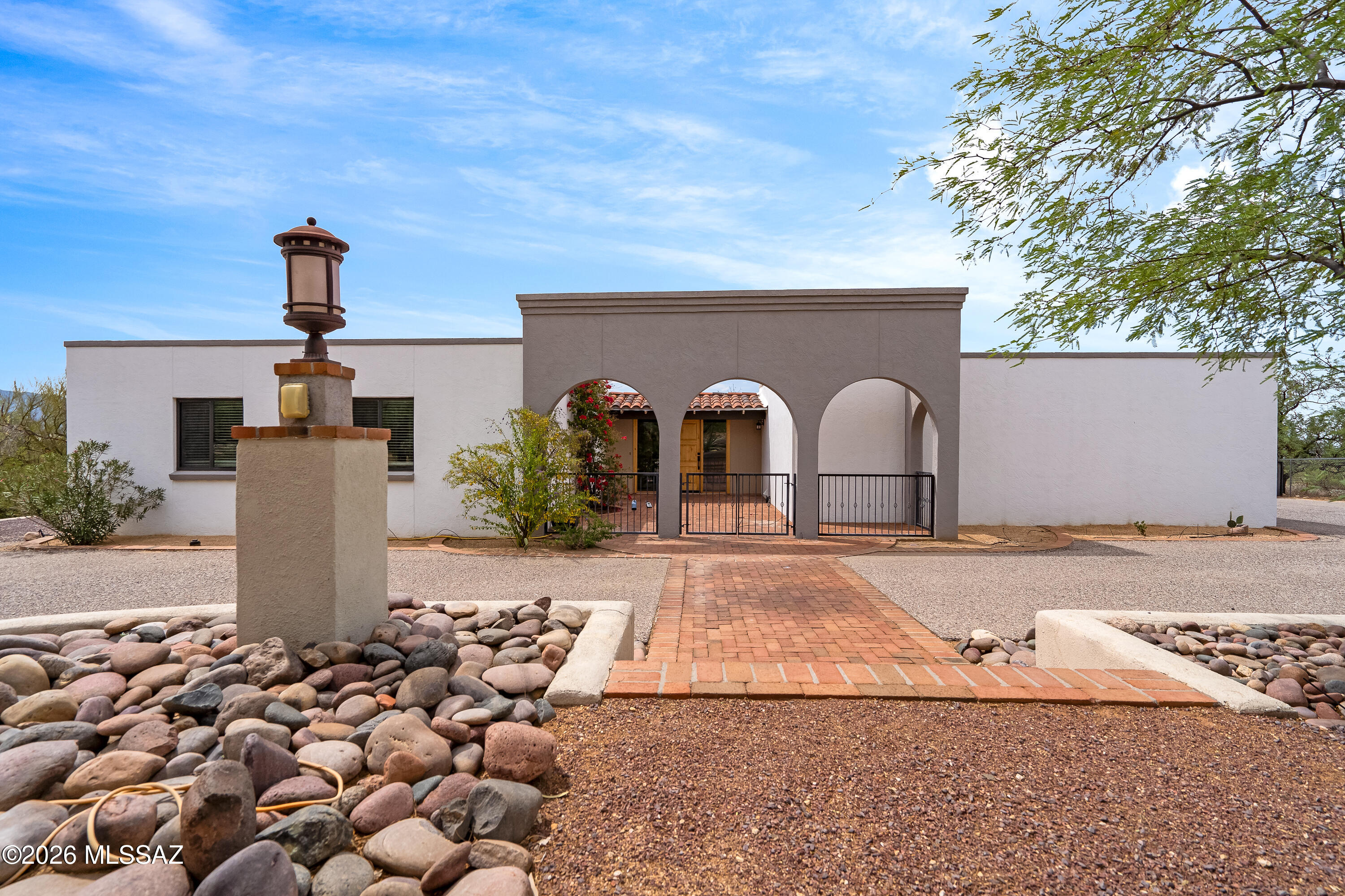9420 East Ravine Trail Tucson, AZ 85749 - Photo 2 of 39 a outdoor space view with a fireplace