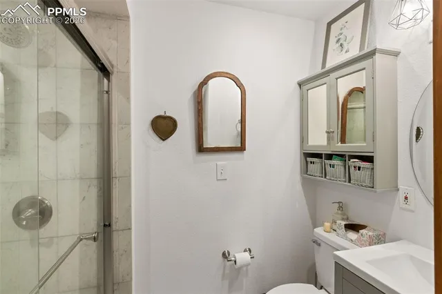 a view of bathroom with a toilet