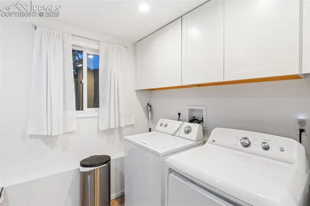 a utility room with dryer and washer