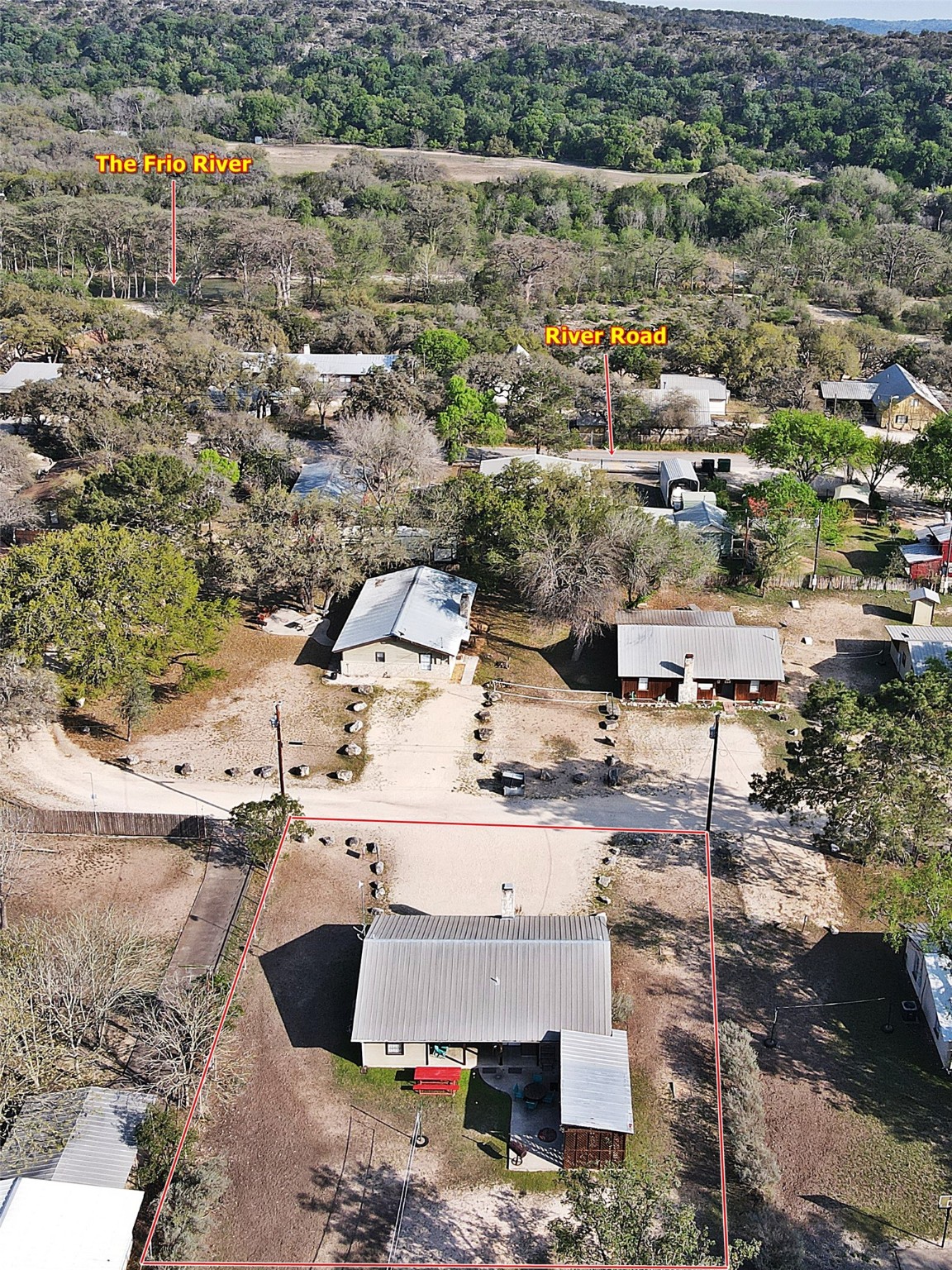 an aerial view of a houses with outdoor space