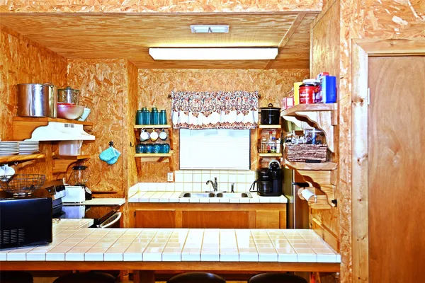 a view of an entryway with a door