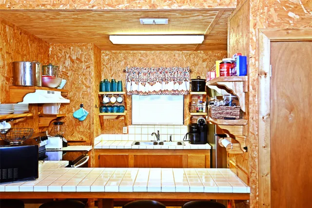 a view of an entryway with a door