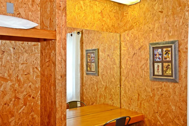 a room with lots of counter and windows