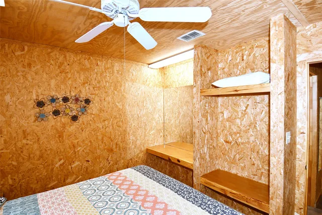 a living room with fireplace furniture and a flat screen tv