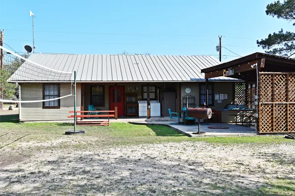 a view of a yard in front of a house