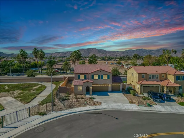 a view of a house with a swimming pool