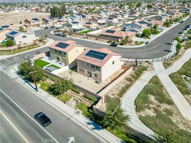 a picture of a building with a garden