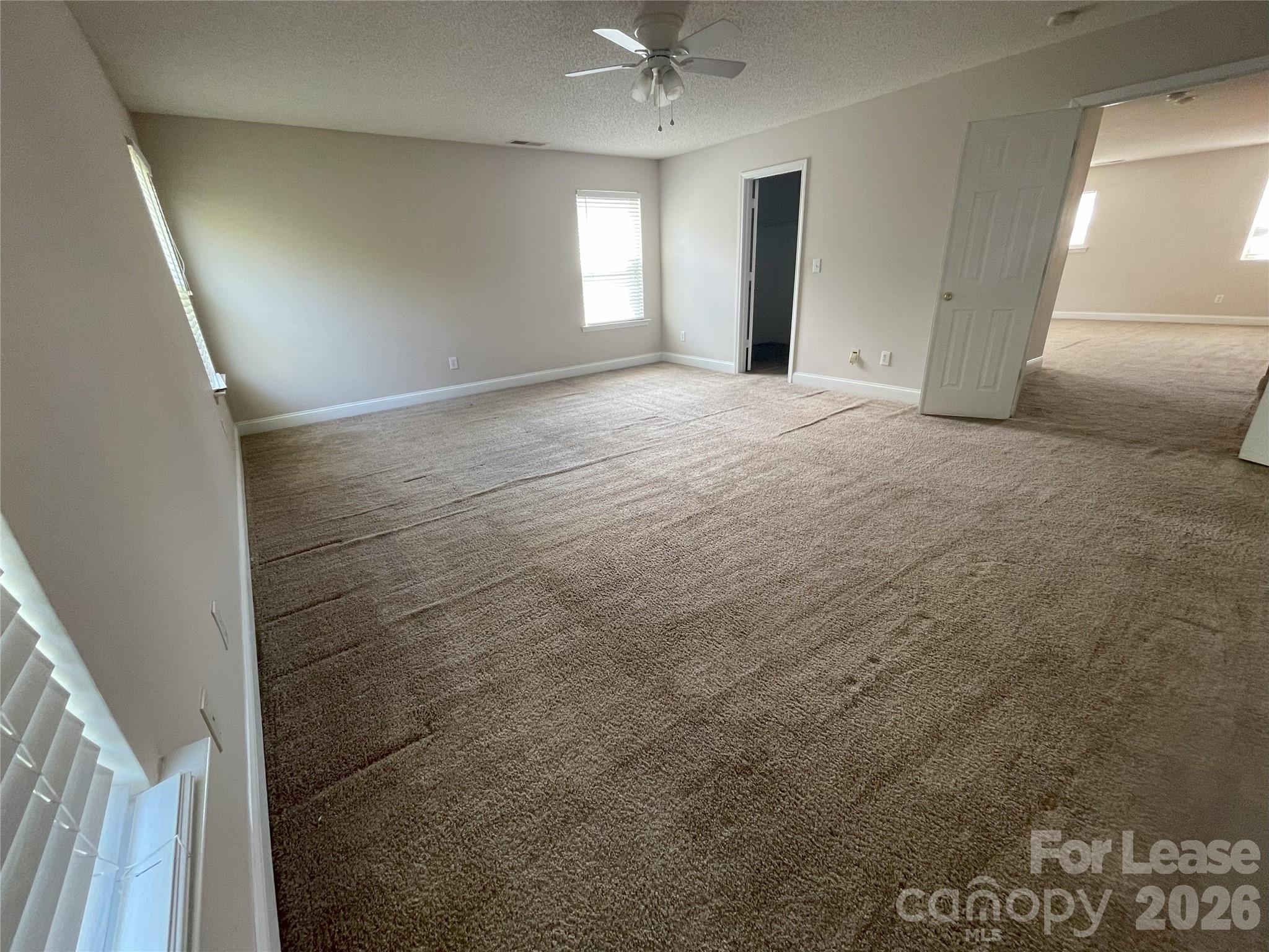 4532 Brookwood Road Charlotte, NC 28215 - Photo 6 of 11 a view of empty room with window