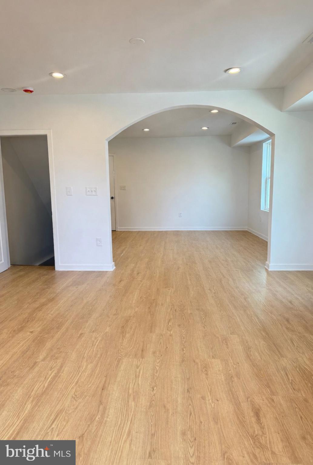 2125 1/2 Oakland Road Baltimore, MD 21220 - Photo 7 of 18 a view of an empty room