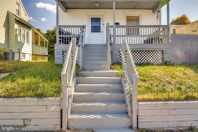 a view of stairs and yard