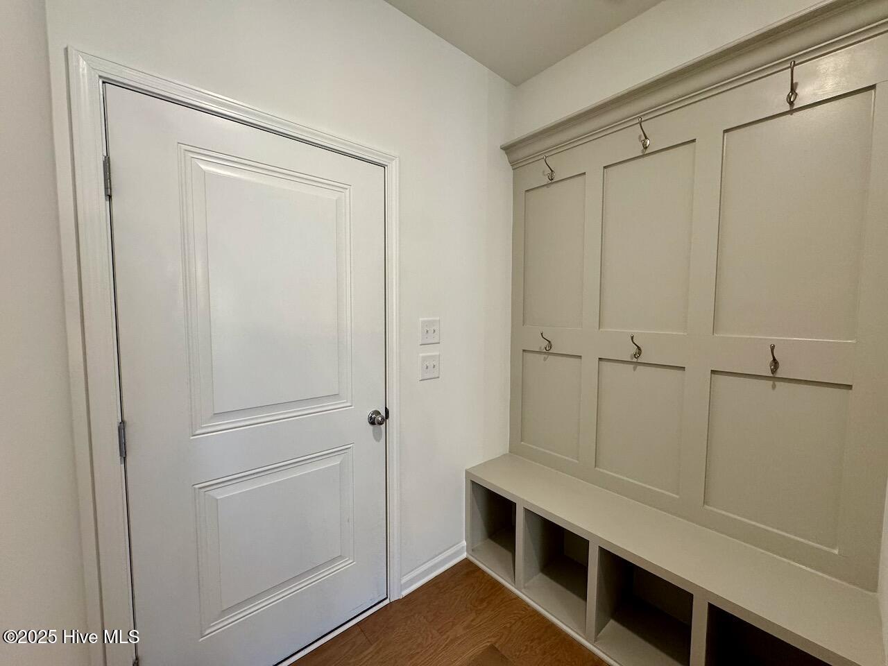 45 Covey Rise Way Lillington, NC 27546 - Photo 18 of 62 HIGHLIGHTS: Custom Built-In Mudroom Bench with a Wescotting Hook Wall and Cubbies, Painted Repose Gray.
