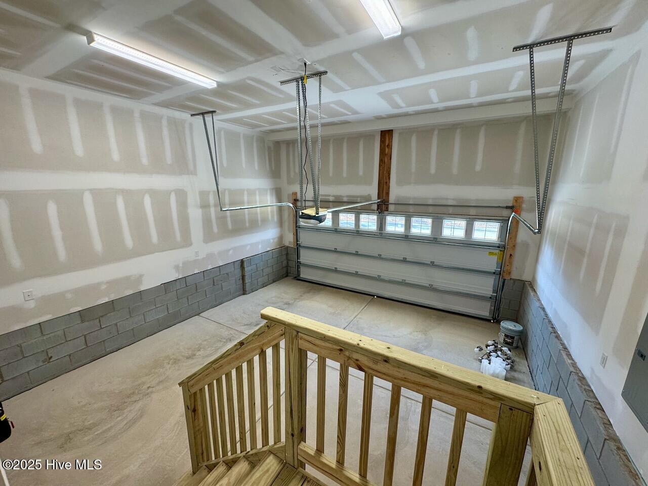 45 Covey Rise Way Lillington, NC 27546 - Photo 19 of 62 HIGHLIGHTS: Tall Garage Ceiling Height (about 13" 8', give or take an inch).