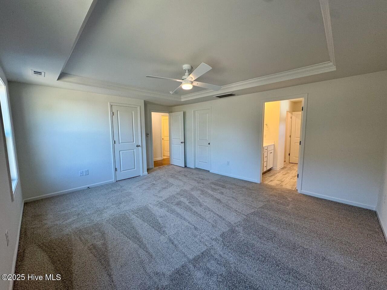 45 Covey Rise Way Lillington, NC 27546 - Photo 29 of 62 HIGHLIGHTS: 2 Walk-In-Closets with Built-In Shelving, Alpine-Cameo Carpet with an Upgraded 8 Lbs Pad, Trey Ceiling, and Ceiling Fan.