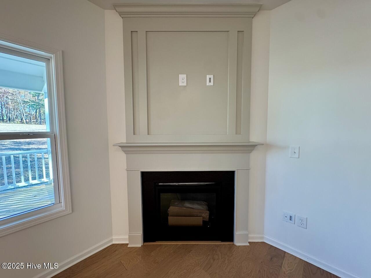 45 Covey Rise Way Lillington, NC 27546 - Photo 8 of 62 HIGHLIGHTS: 36" Gas Log Fireplace with a Wescott Mantle with Trim Work.