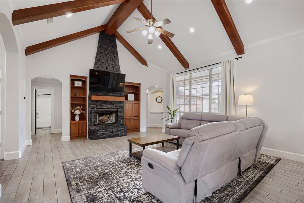 603 Ash Street Pilot Point, TX 76258 - Photo 7 of 28 Vaulted ceiling featuring exposed wood beams and recessed lighting