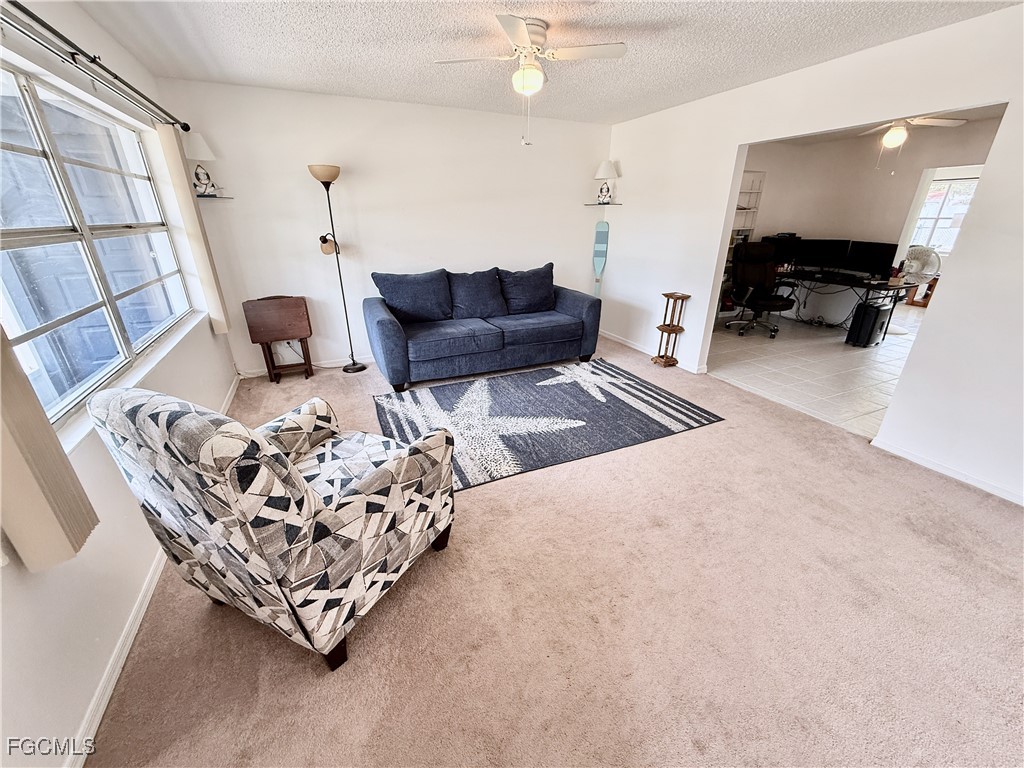 314 Vermont Way Lehigh Acres, FL 33936 - Photo 6 of 45 a living room with furniture
