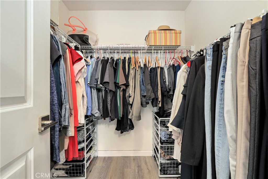 28364 Mirabelle Lane Saugus, CA 91350 - Photo 14 of 32 a view of walk in closet with clothes