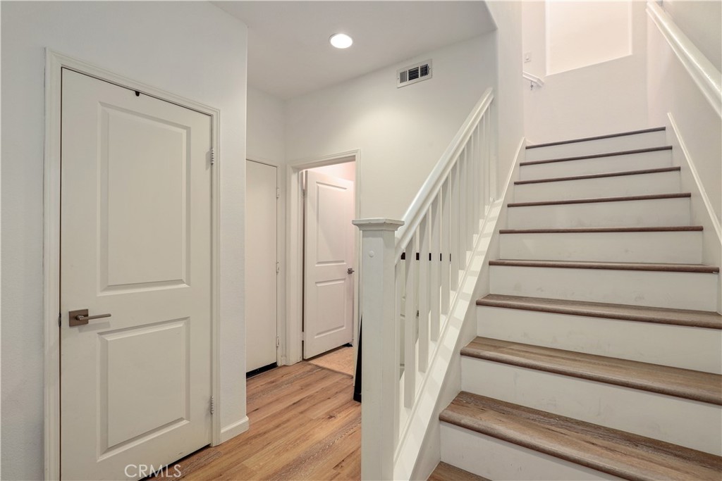 28364 Mirabelle Lane Saugus, CA 91350 - Photo 21 of 32 a view of entryway with wooden floor and stairs