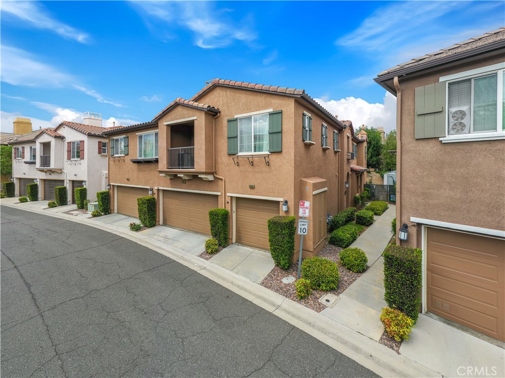 28364 Mirabelle Lane Saugus, CA 91350 - Photo 23 of 32 a front view of a house with yard
