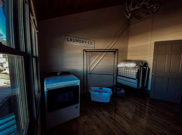 a kitchen with a sink and refrigerator