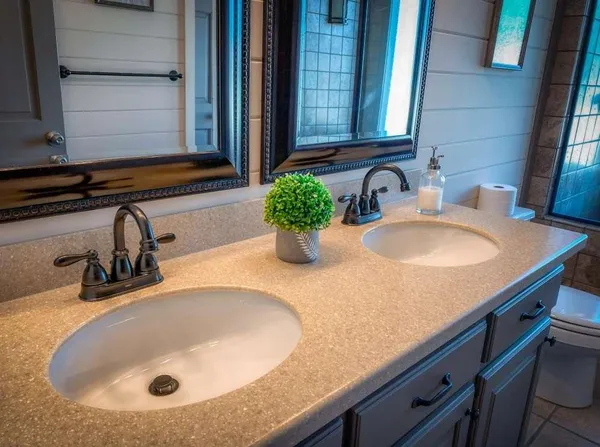 a bathroom with a sink and a mirror