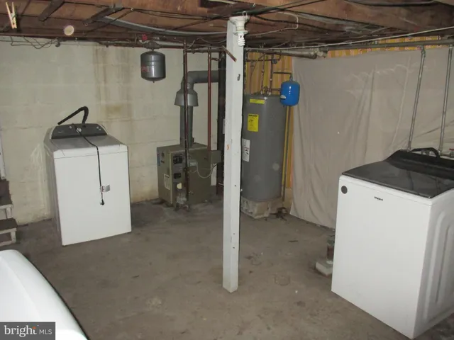 a utility room with a washer and dryer