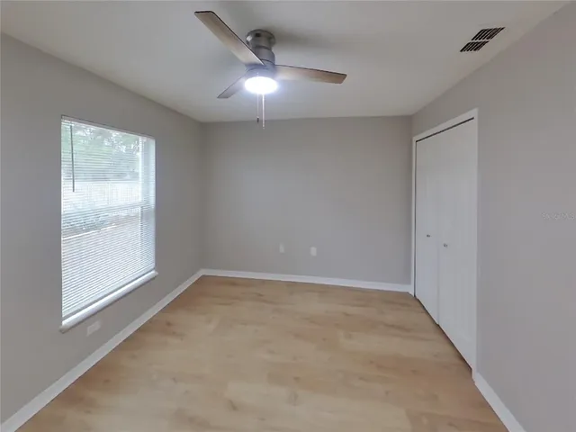 an empty room with windows