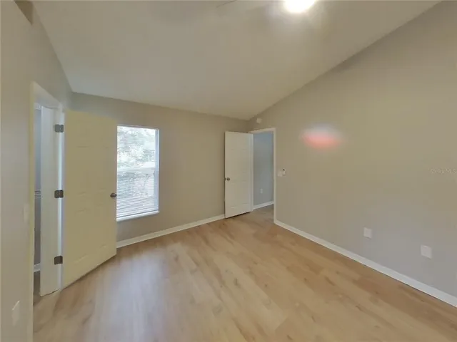 an empty room with windows