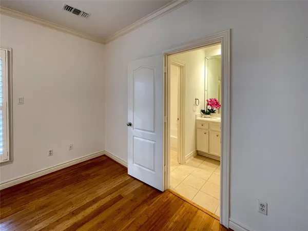 a view of a door and a window