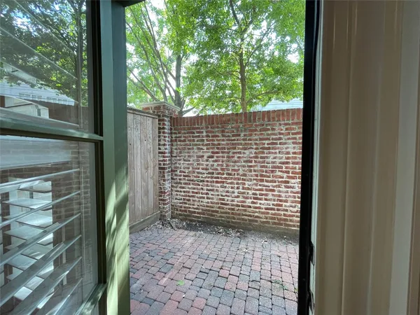 a building outdoor space with patio furniture