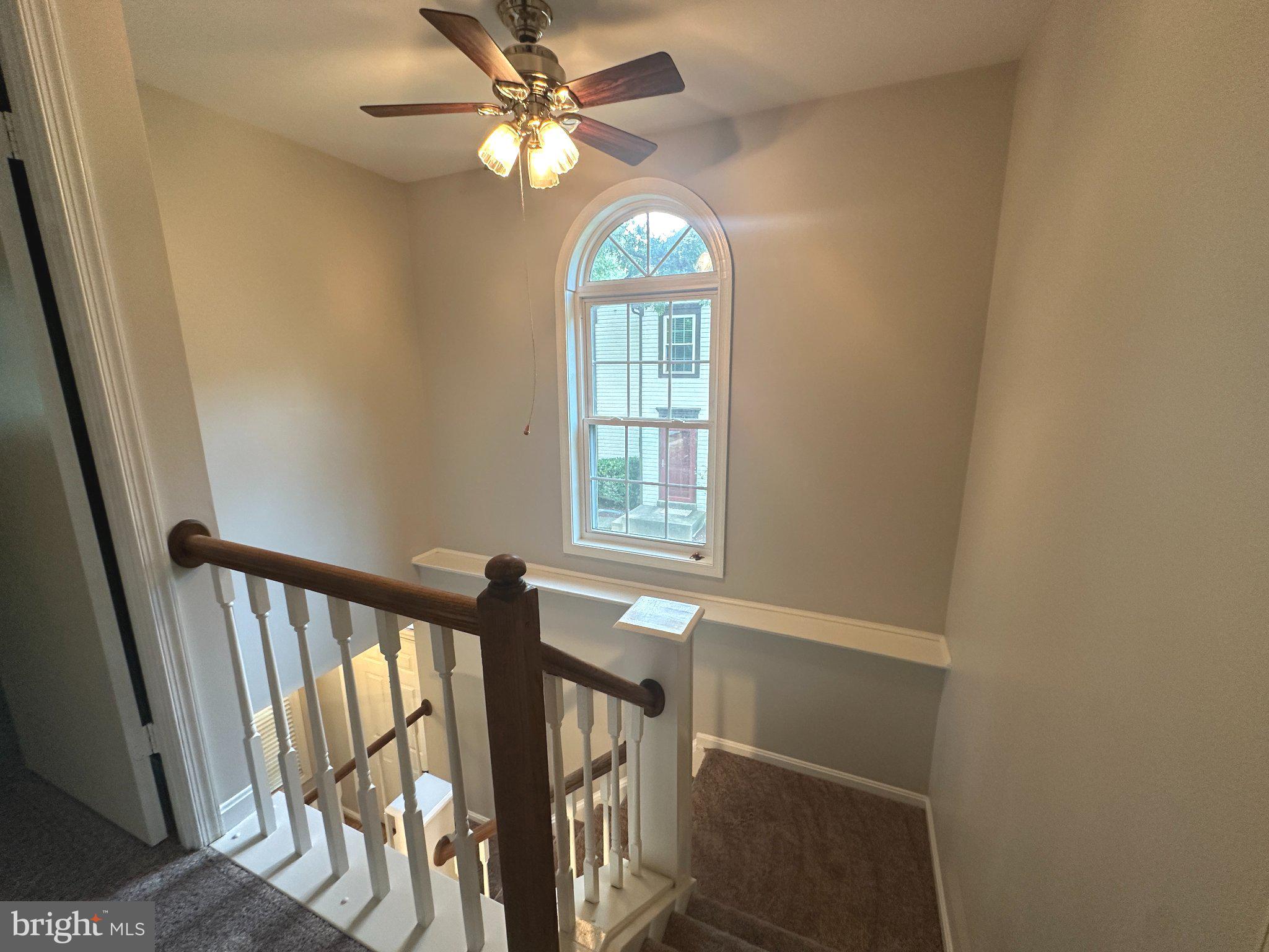 11928 Sentinel Point Court Reston, VA 20191 - Photo 13 of 23 Bright and inviting staircase view.
