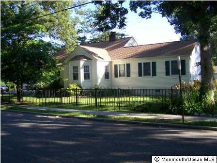 2313 Dorsett Dock Road Point Pleasant, NJ 08742 - Photo 1 of 3 a front view of a house with a garden