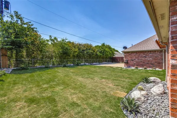 a view of outdoor space and yard