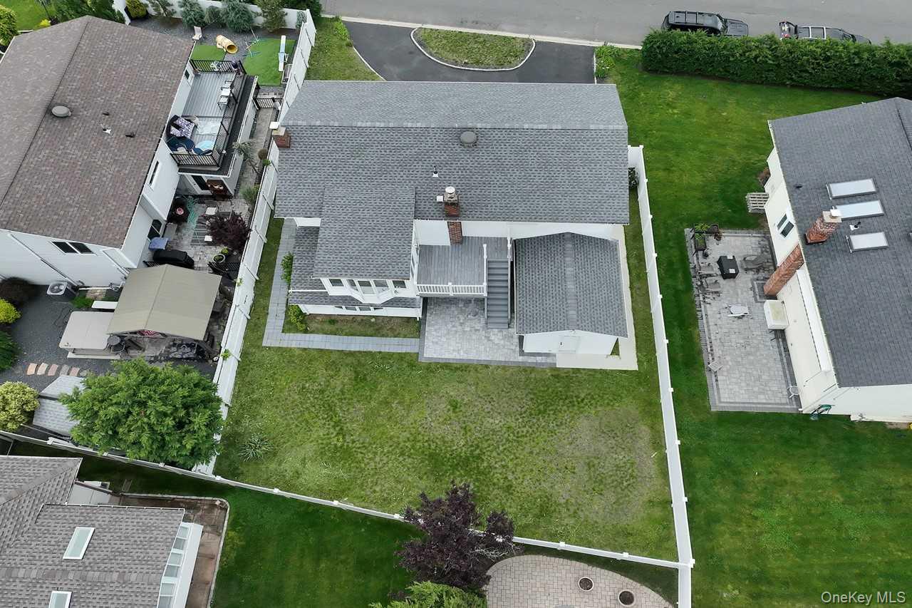 107 Beverly Road Massapequa, NY 11758 - Photo 37 of 41 an aerial view of a house